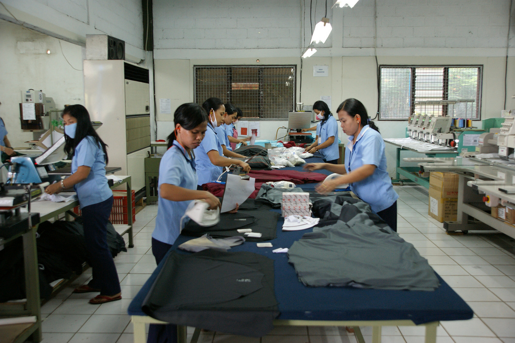 A factory visited by the ILO during 'Better Work Indonesia', one of the two major campaigns analysed in Hauf's book. (ILO Asia-Pacific) Garment workers working at a factory