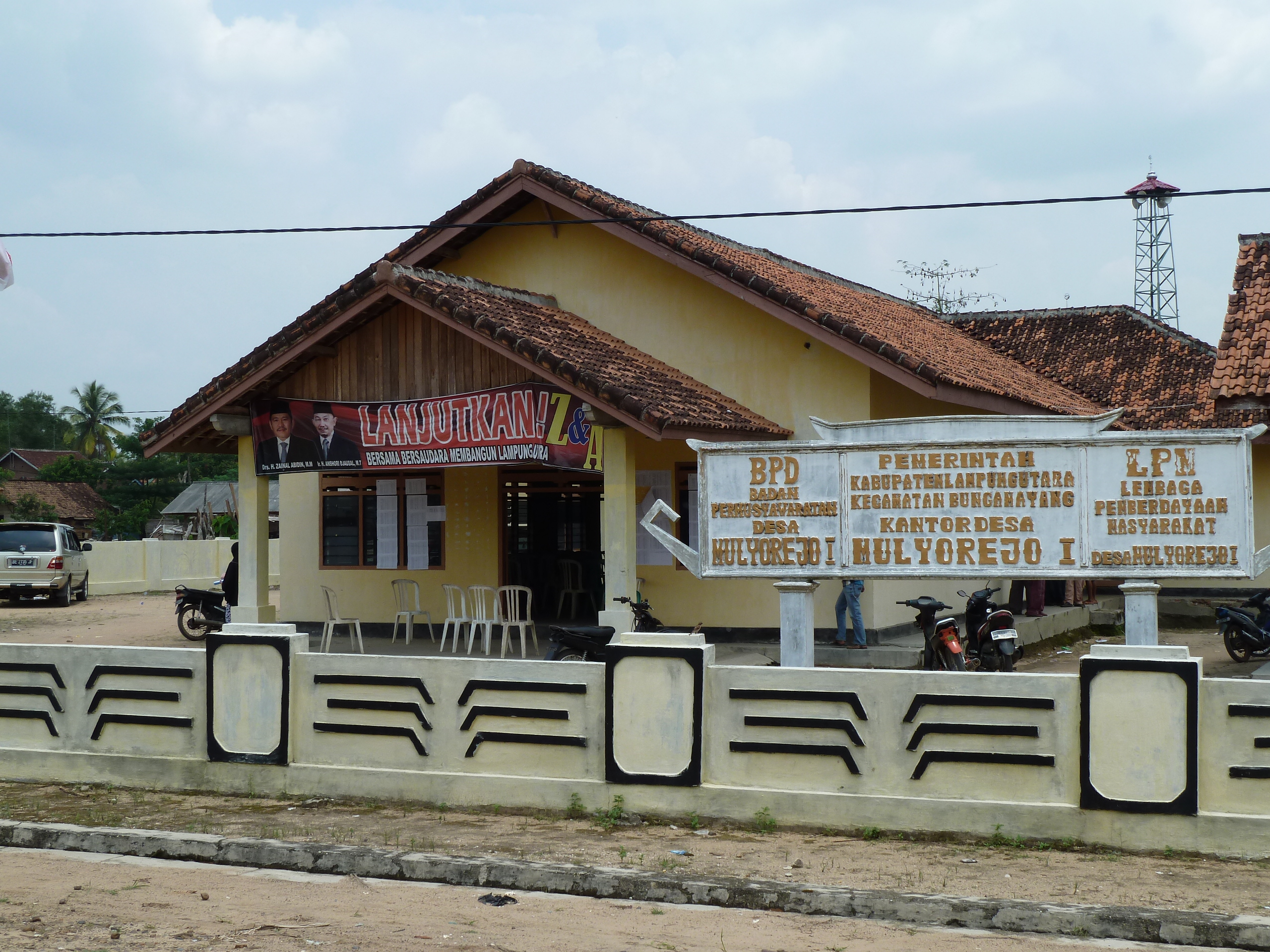 The village head as patron