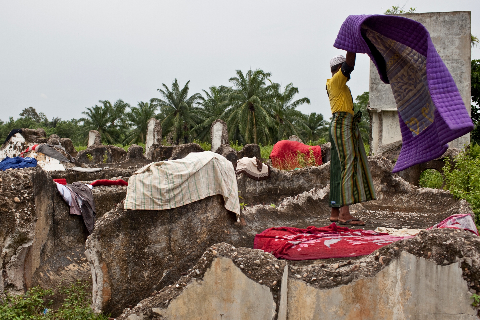 Rohingya man in a camp in Bayeun, Aceh - Credit: Henri Ismail